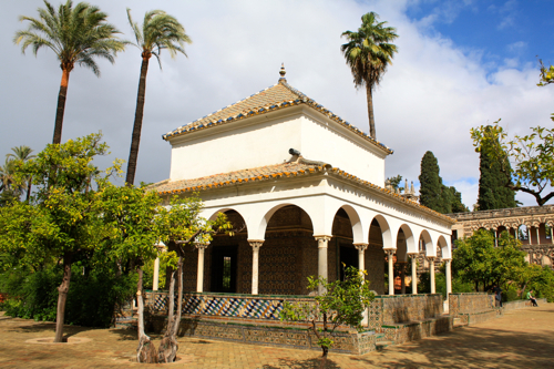 A pretty little building in the gardens of the Alcazar of Seville moorish architecture