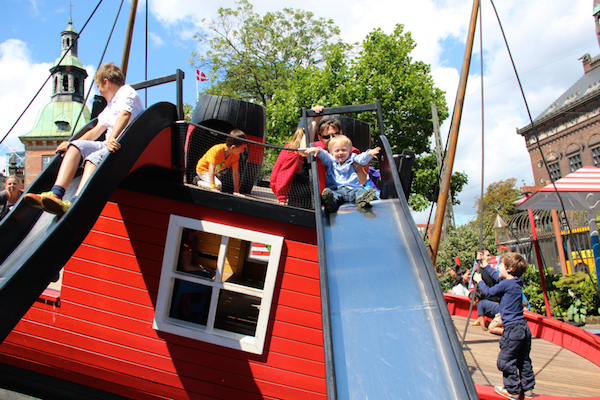 Traveling with a toddler means more opportunities to consort with the locals -- at the playground! Here we are at Tivoli Gardens playground in Copenhagen. #familytravel
